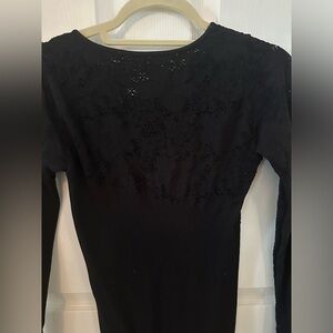 BCBG xsmall long-sleeved black ribbed dress. Adorable and very flattering!